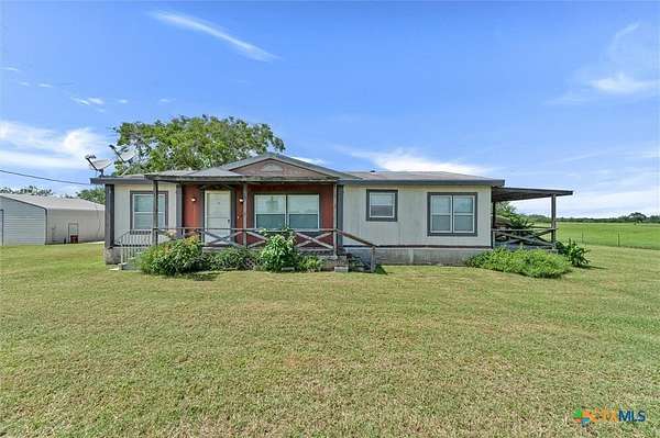 62 Acres of Land with Home for Sale in Luling, Texas