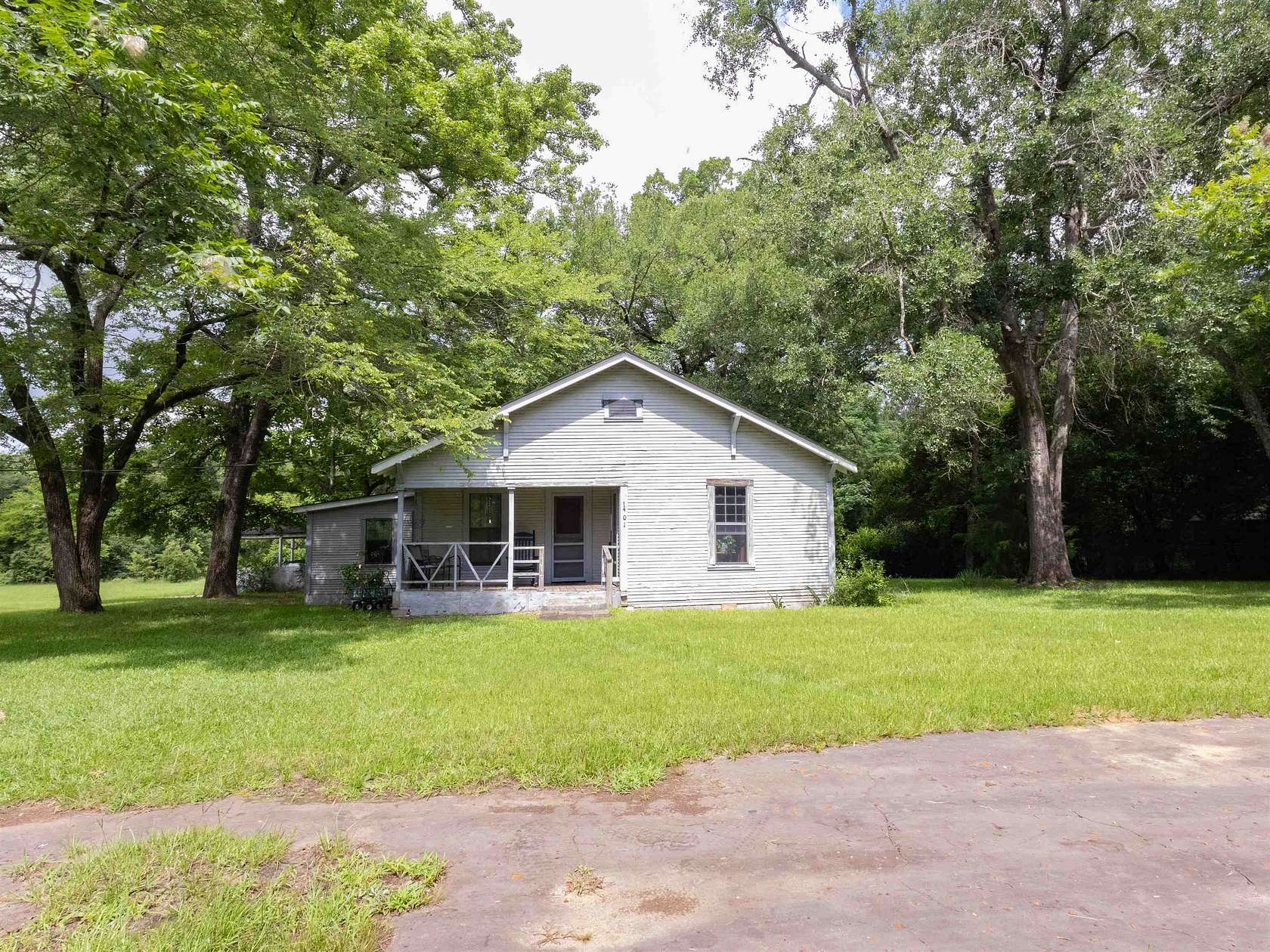 1.64 Acres of Land with Home for Sale in Daingerfield, Texas
