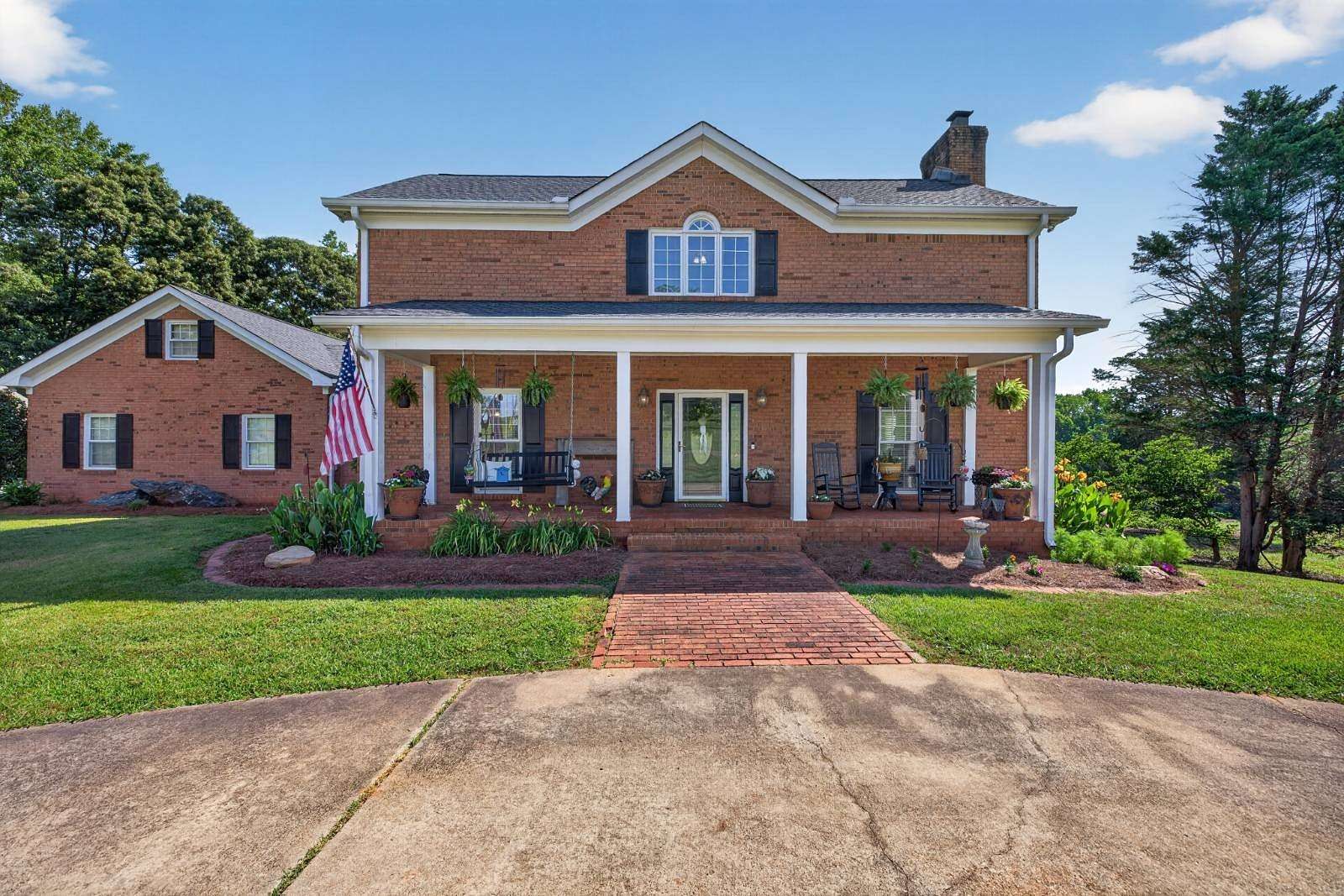 12 Acres of Land with Home for Auction in Flowery Branch, Georgia