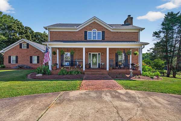 12 Acres of Land with Home for Auction in Flowery Branch, Georgia