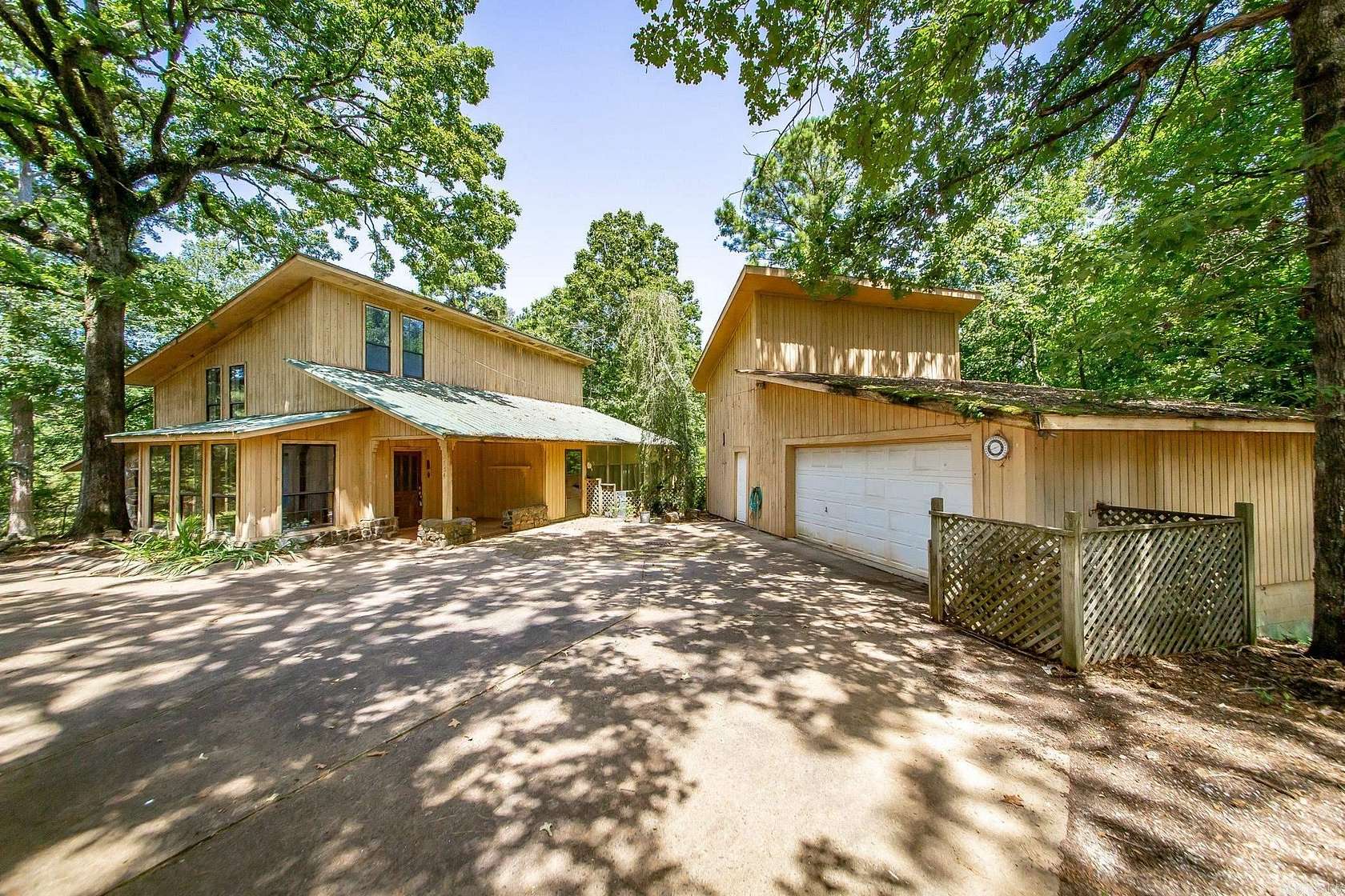 6.5 Acres of Land with Home for Sale in Bismarck, Arkansas