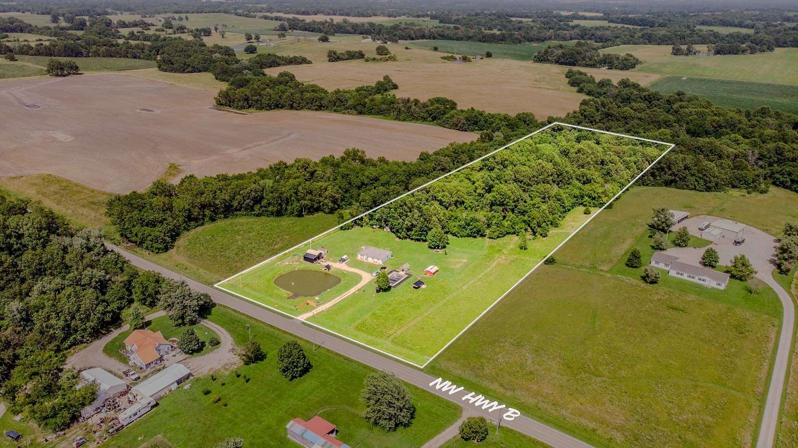 9.5 Acres of Land with Home for Sale in Urich, Missouri