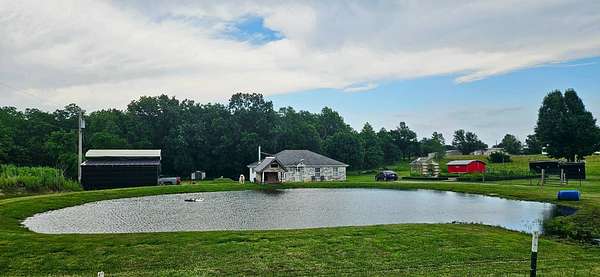 9.5 Acres of Land with Home for Sale in Urich, Missouri