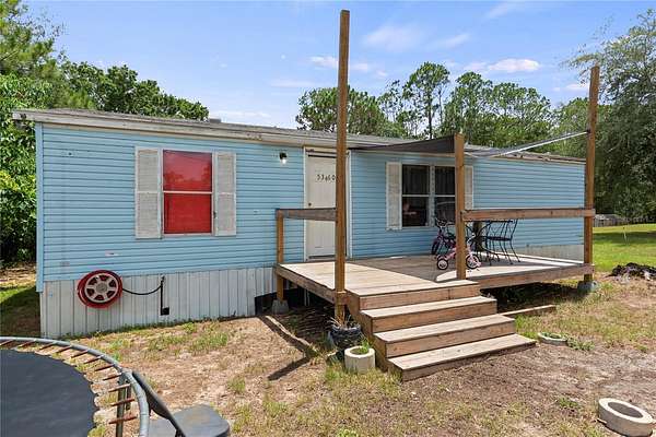 1.72 Acres of Land with Home for Sale in Polk City, Florida