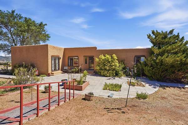5 Acres of Land with Home for Sale in Sandia Park, New Mexico