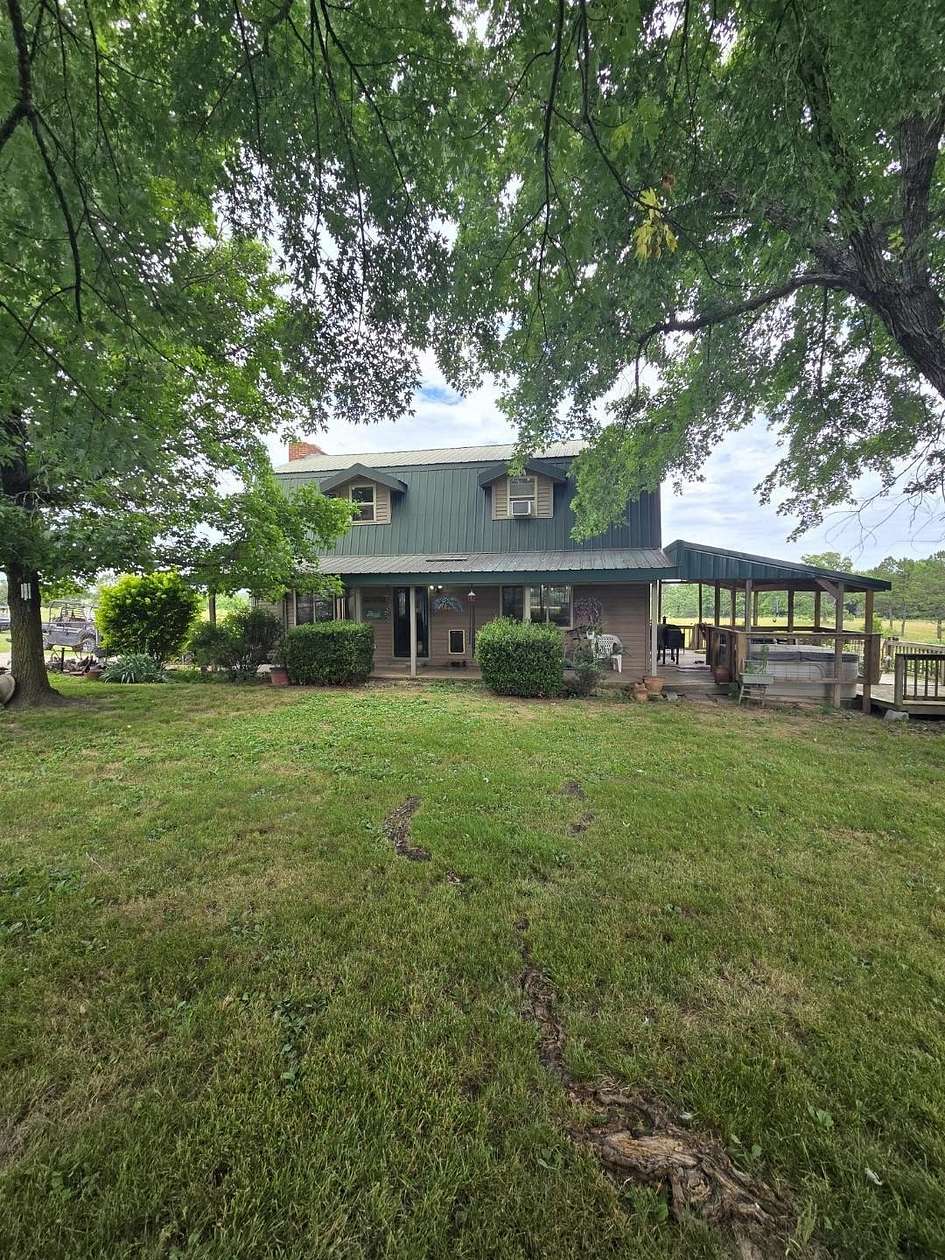 20.8 Acres of Land with Home for Sale in Birch Tree, Missouri
