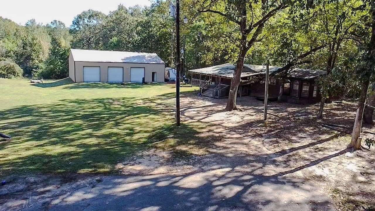 7.49 Acres of Land with Home for Sale in Karnack, Texas