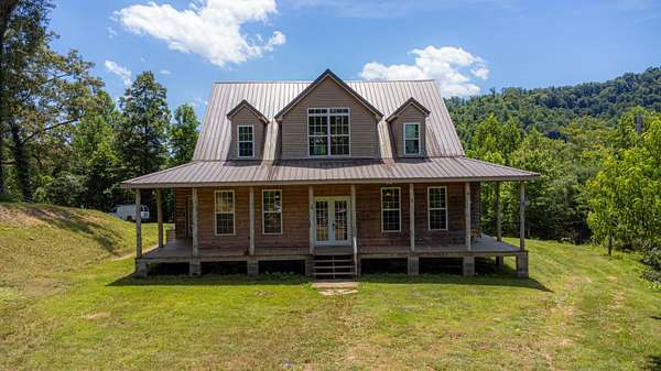 55 Acres of Recreational Land with Home for Sale in Flat Lick, Kentucky