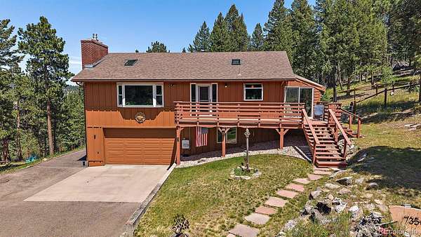 2 Acres of Land with Home for Sale in Evergreen, Colorado