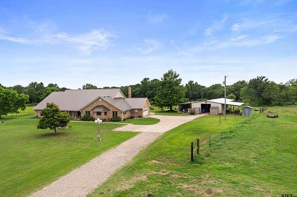 96 Acres of Recreational Land with Home for Sale in Bogata, Texas