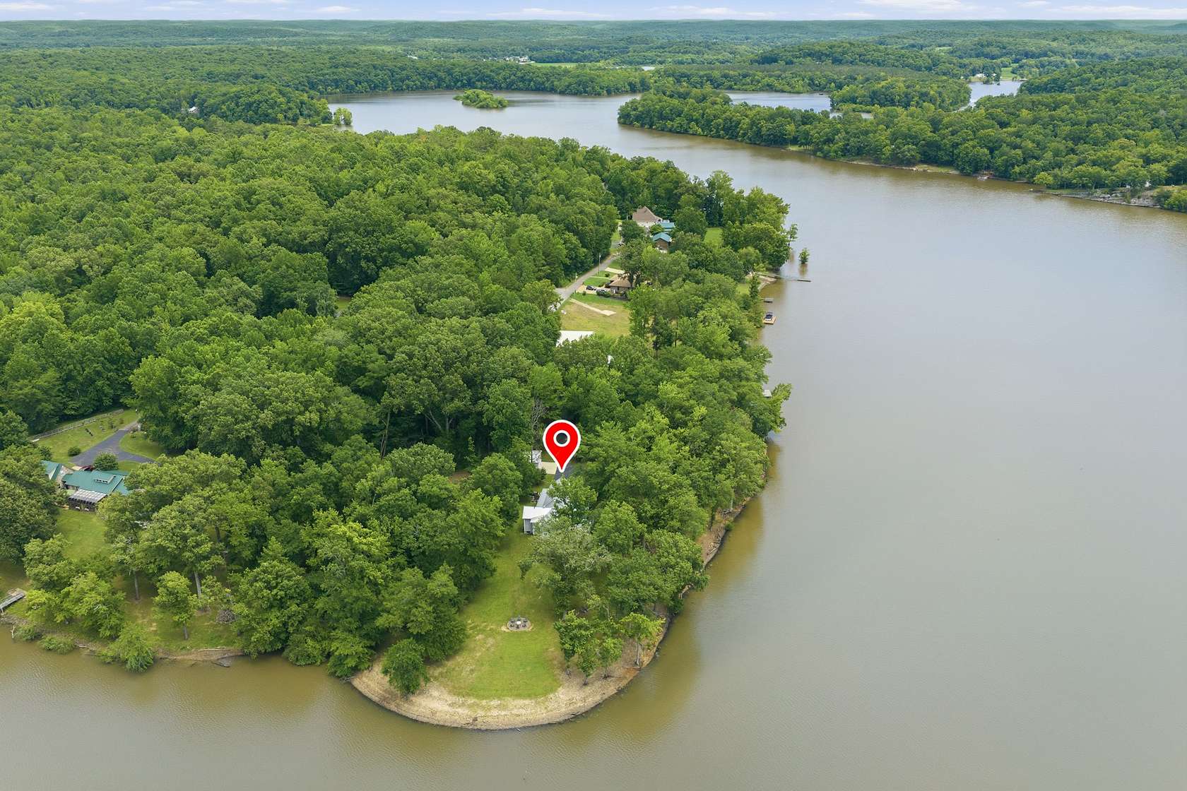 6.86 Acres of Land with Home for Sale in Parsons, Tennessee