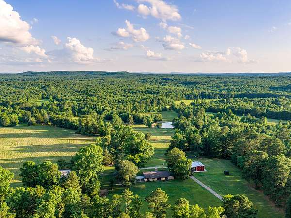 322 Acres of Land with Home for Sale in Ore City, Texas