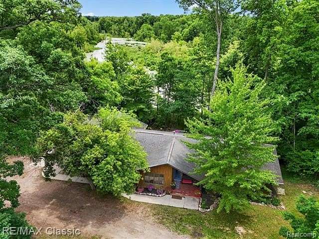 6 Acres of Land with Home for Sale in Holly Township, Michigan