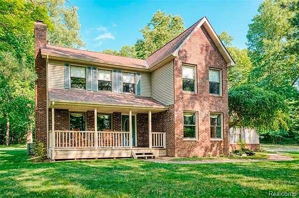 1.56 Acres of Land with Home for Sale in Hamburg Township, Michigan