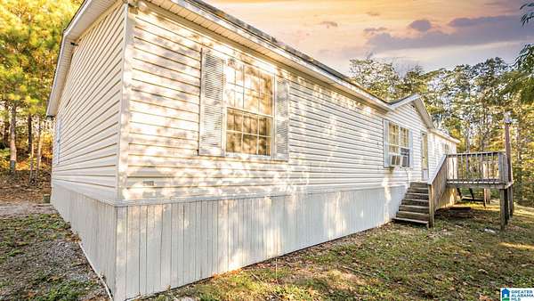 1.88 Acres of Land with Home for Sale in Cropwell, Alabama