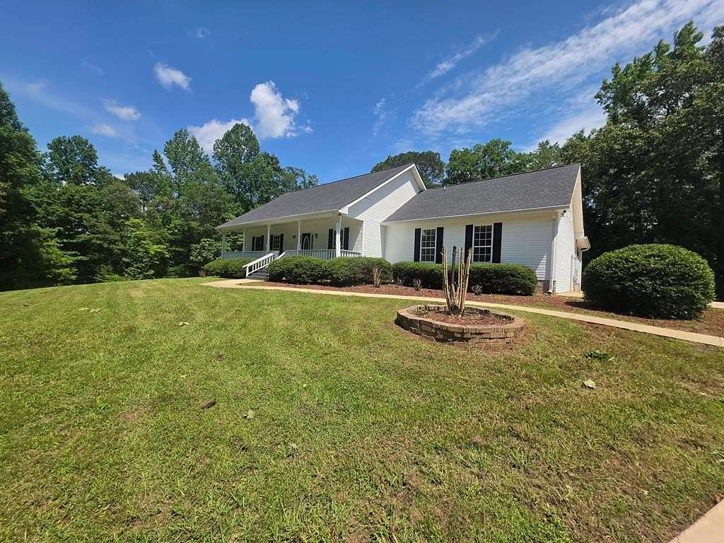 6.6 Acres of Land with Home for Sale in Anniston, Alabama