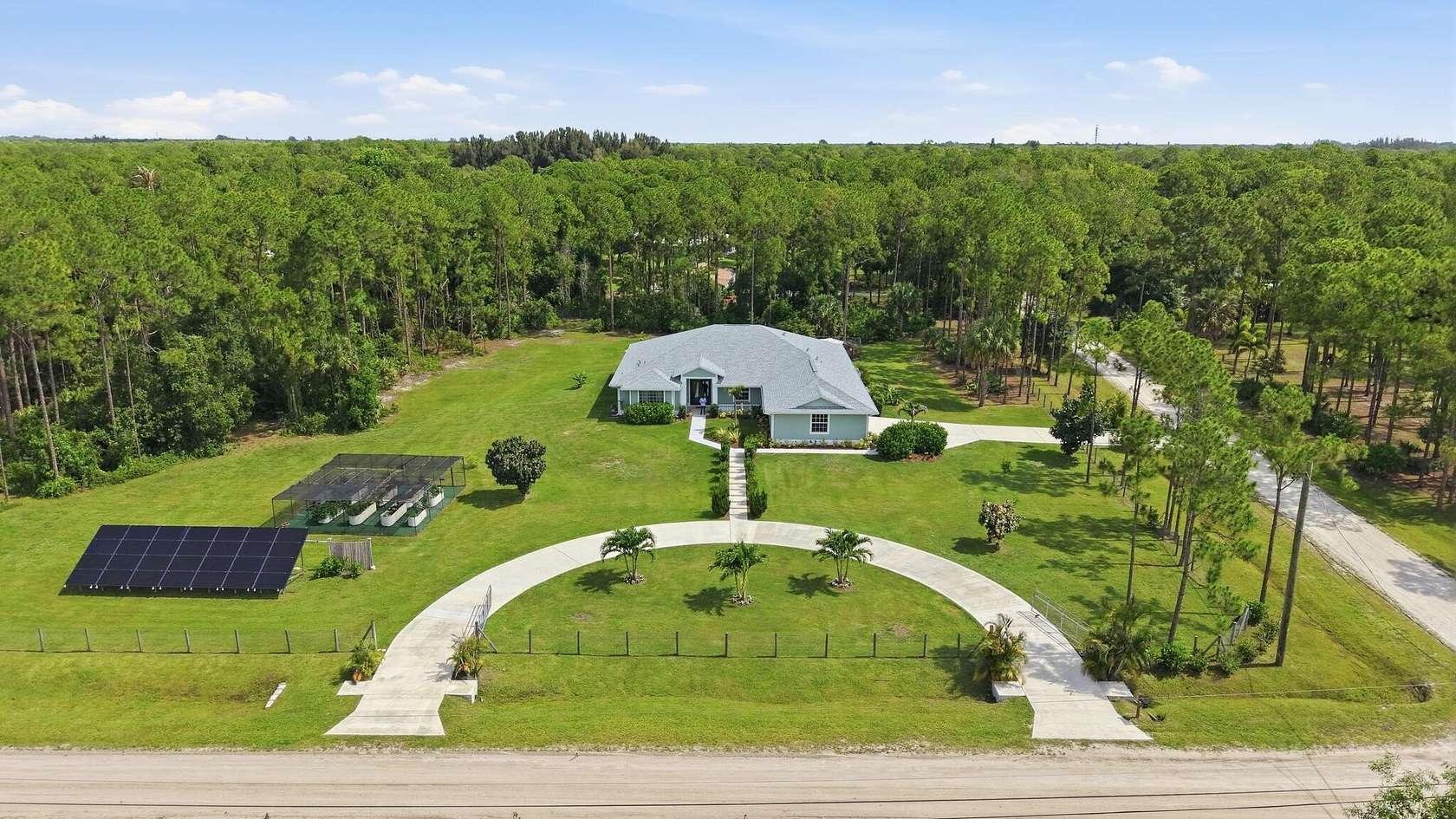 2.5 Acres of Land with Home for Sale in Jupiter, Florida