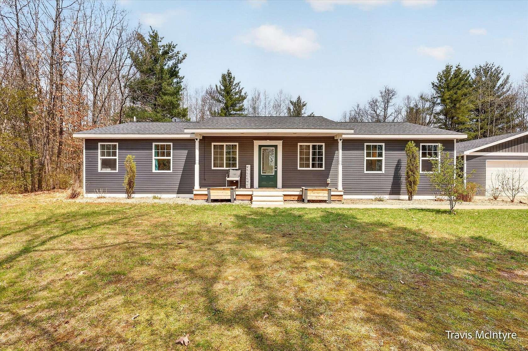 6.9 Acres of Land with Home for Sale in Howard City, Michigan