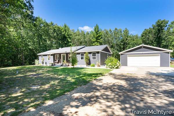 6.9 Acres of Land with Home for Sale in Howard City, Michigan