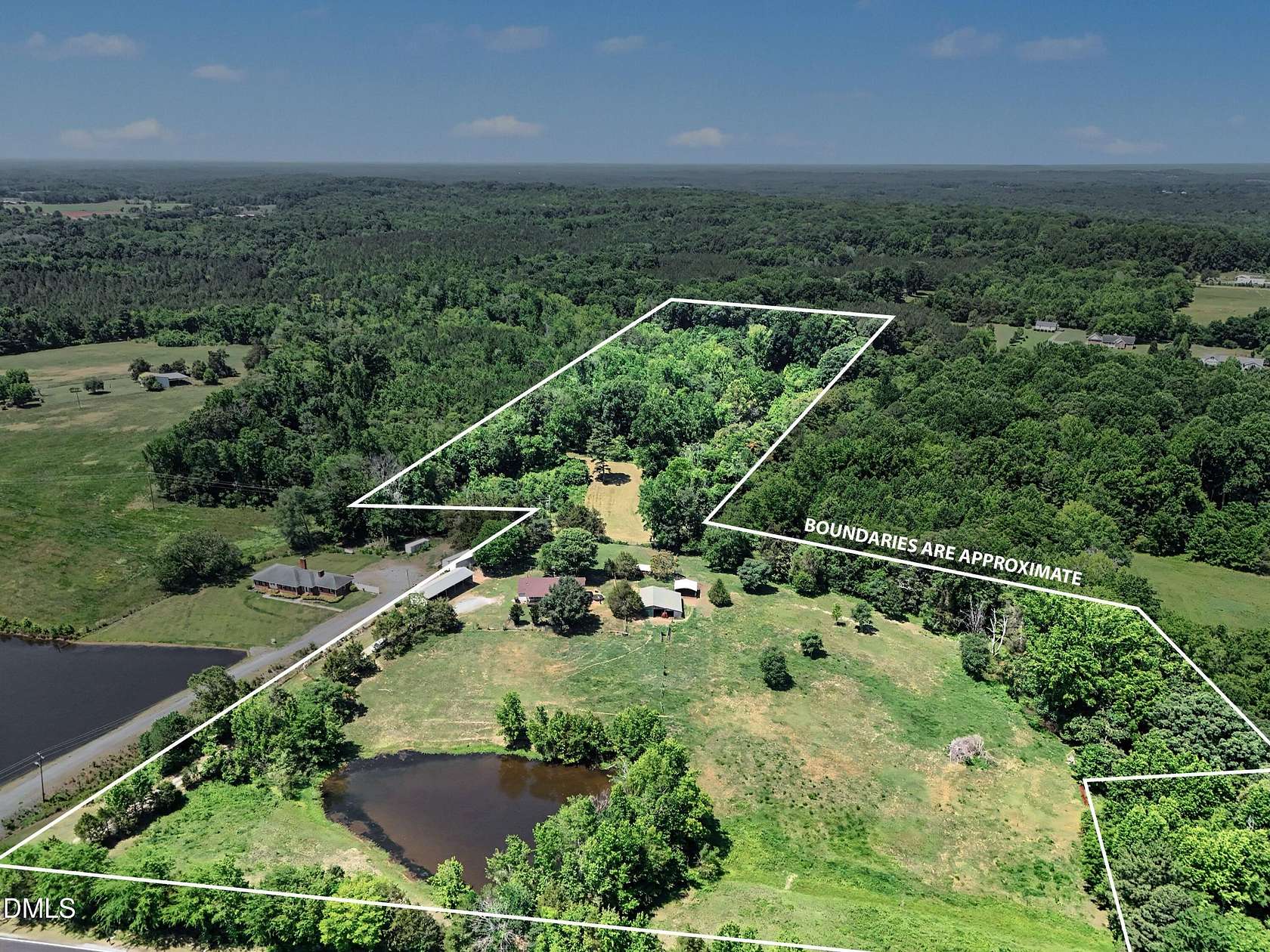20 Acres of Land with Home for Sale in Siler City, North Carolina