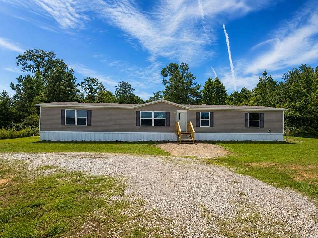 1.73 Acres of Land with Home for Sale in Booneville, Mississippi
