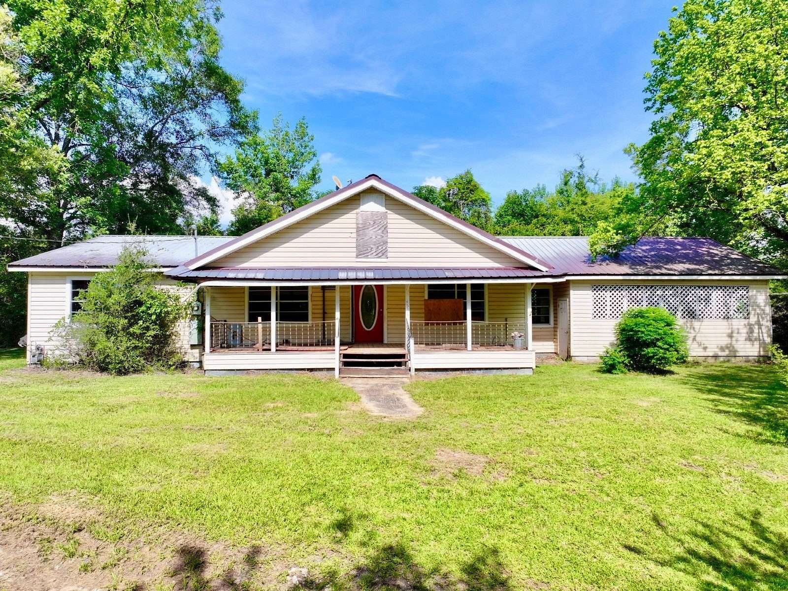 6.82 Acres of Land with Home for Sale in Coffeeville, Alabama