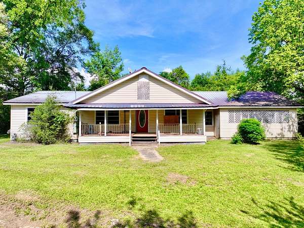 6.82 Acres of Land with Home for Sale in Coffeeville, Alabama