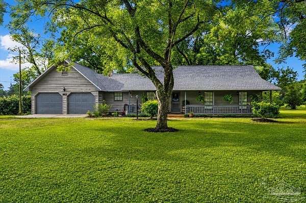 6.25 Acres of Land with Home for Sale in Holt, Florida