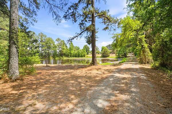 3.88 Acres of Land with Home for Sale in Snow Camp, North Carolina