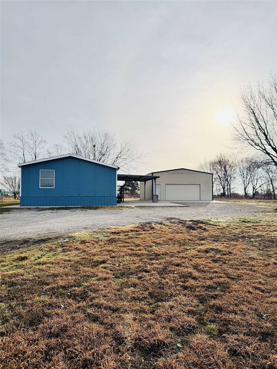 1.84 Acres of Land with Home for Lease in Quinlan, Texas