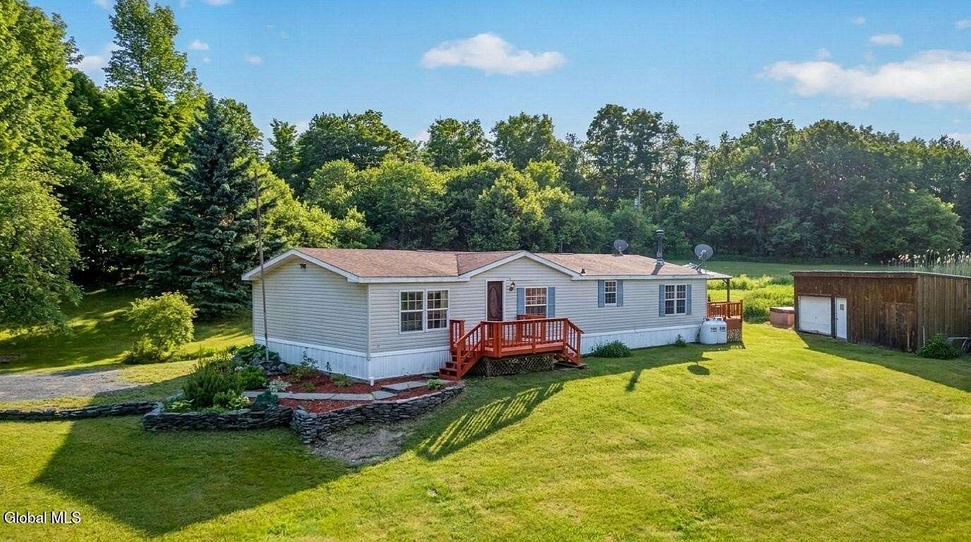 3.66 Acres of Land with Home for Sale in Summit, New York