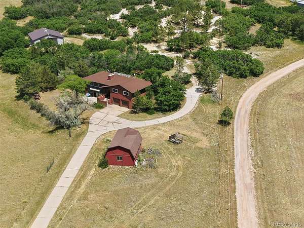 14.9 Acres of Land with Home for Sale in Castle Rock, Colorado