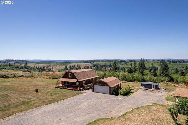 10.8 Acres of Land with Home for Sale in Rainier, Oregon