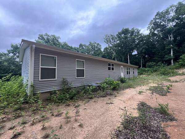 5.82 Acres of Land with Home for Sale in Annville, Kentucky