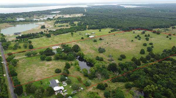29.5 Acres of Agricultural Land with Home for Sale in Quinlan, Texas