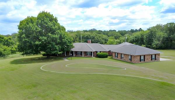 10 Acres of Land with Home for Sale in Argyle, Texas