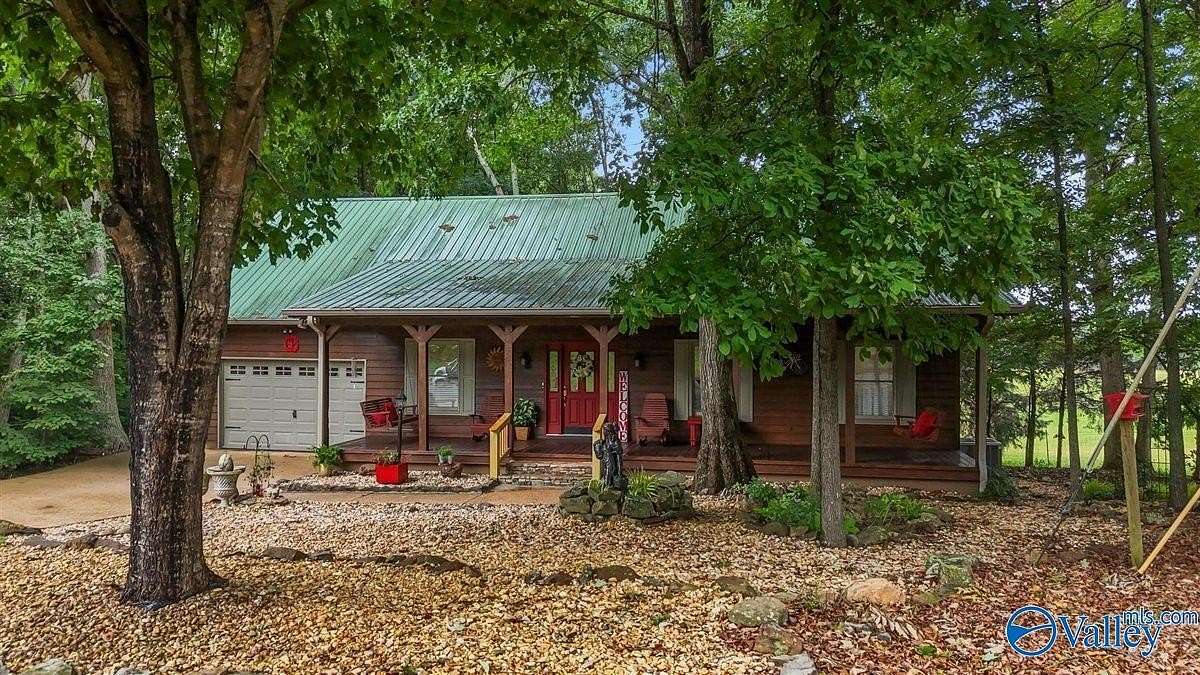 7.4 Acres of Land with Home for Sale in Grant, Alabama