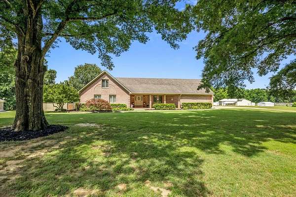 6.3 Acres of Land with Home for Sale in Eads, Tennessee