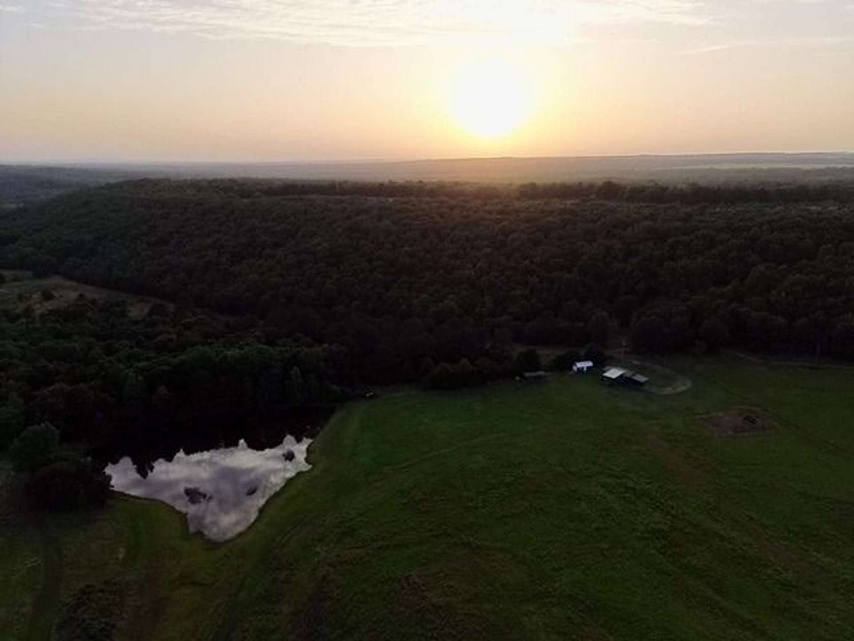110 Acres of Land with Home for Sale in Romance, Arkansas