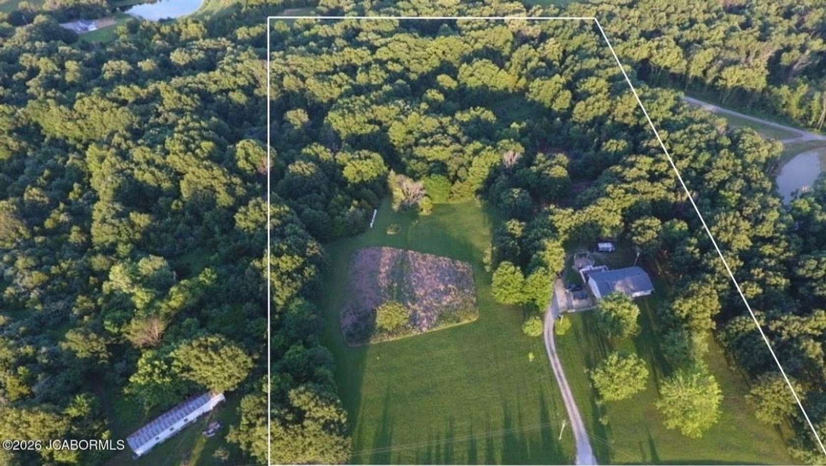 10 Acres of Land with Home for Sale in Fulton, Missouri