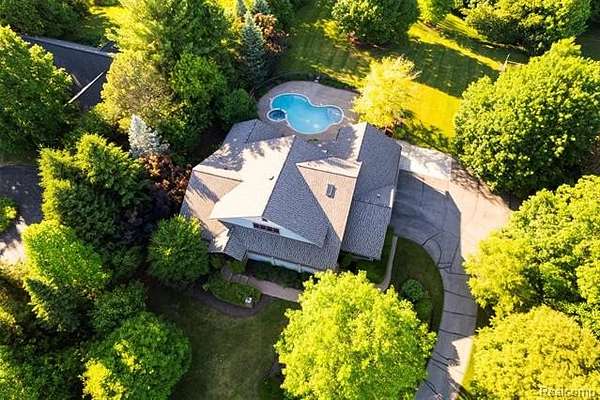 2 Acres of Land with Home for Sale in Salem Township, Michigan