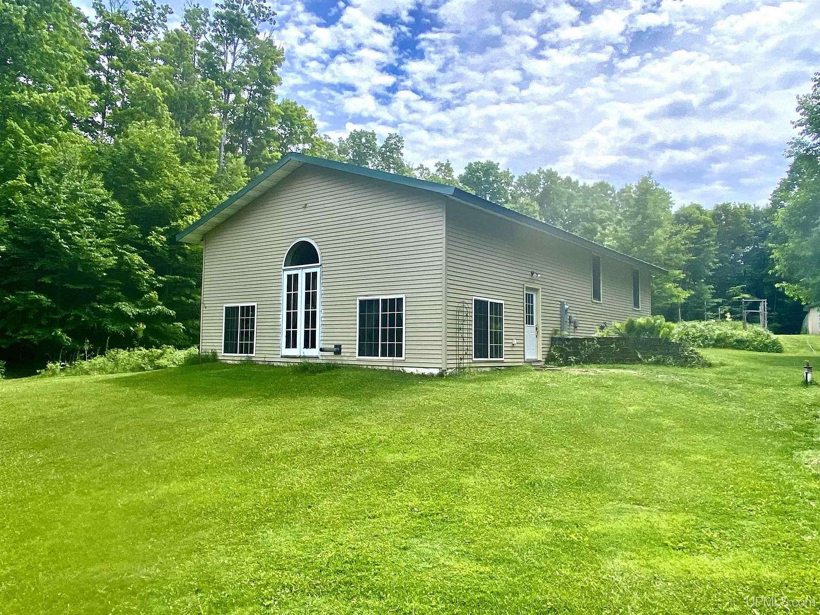 20 Acres of Recreational Land with Home for Sale in Curtis, Michigan