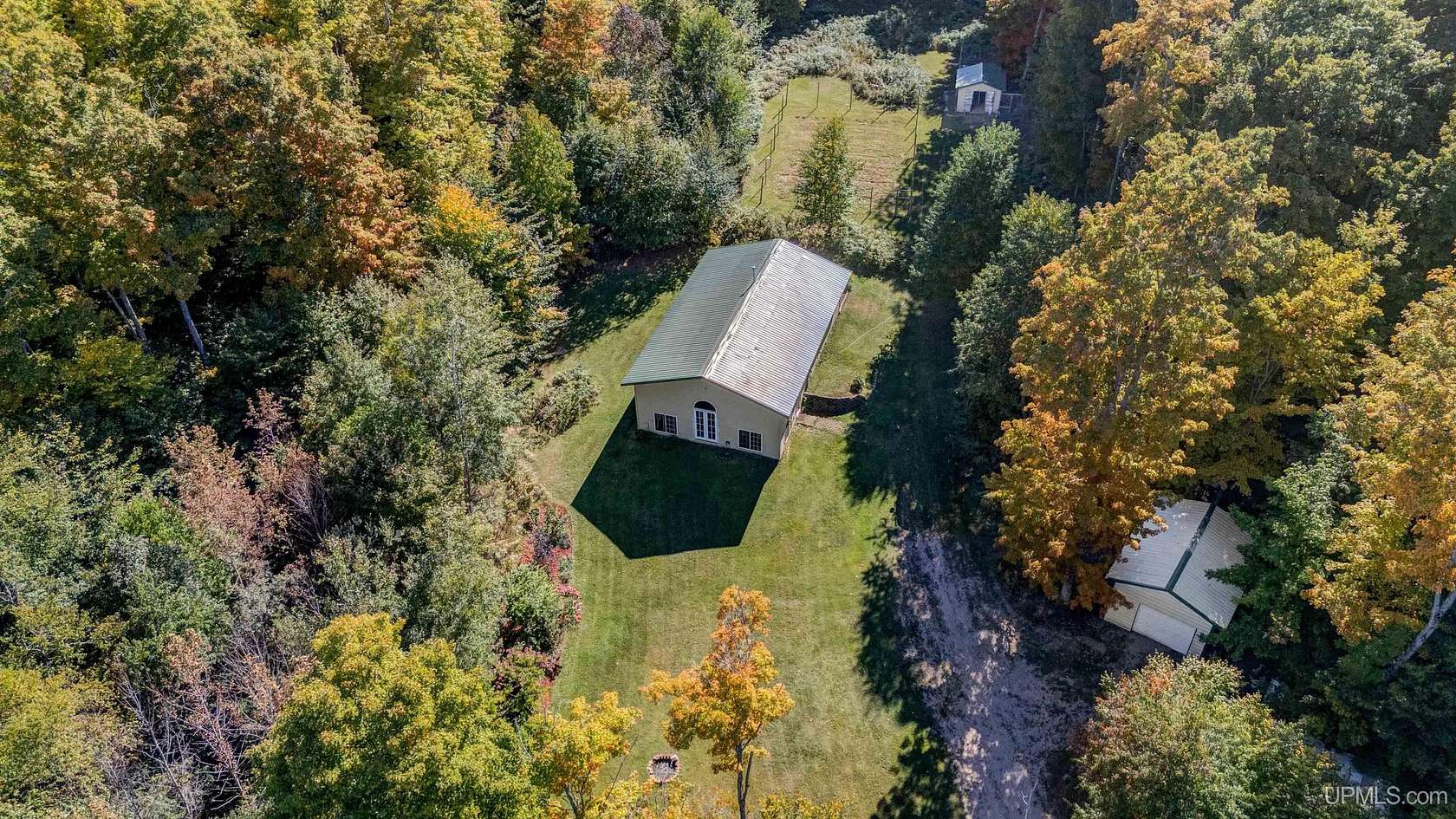20 Acres of Recreational Land with Home for Sale in Curtis, Michigan