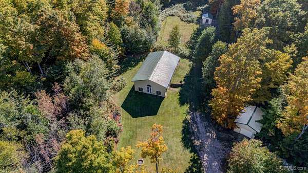 20 Acres of Recreational Land with Home for Sale in Curtis, Michigan