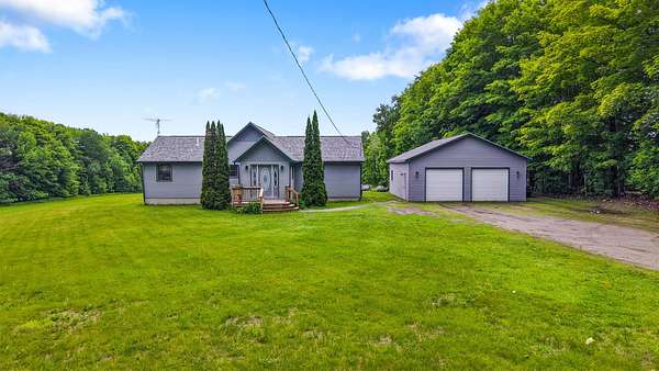 5.73 Acres of Land with Home for Sale in Corinna, Maine