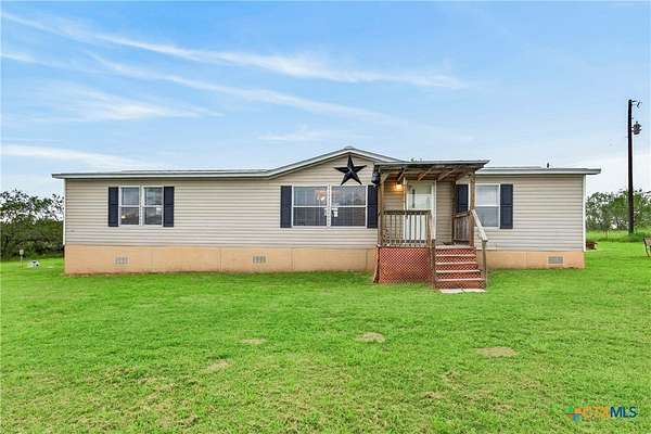 8.28 Acres of Land with Home for Sale in Gonzales, Texas