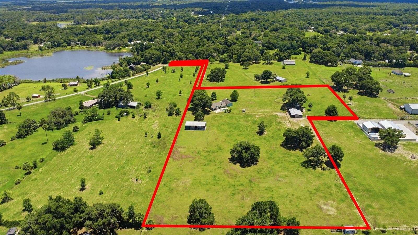 9.63 Acres of Land with Home for Sale in Geneva, Florida