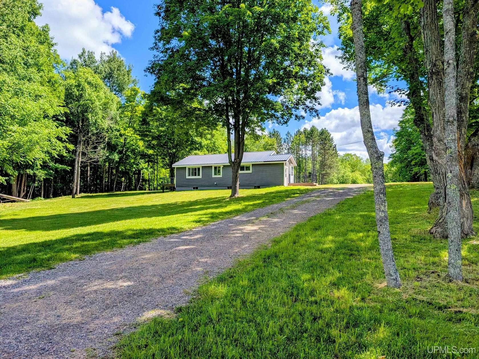 23.1 Acres of Recreational Land with Home for Sale in Iron River, Michigan