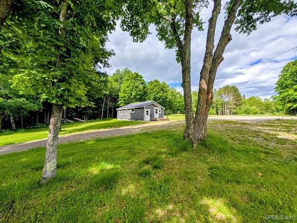 23.1 Acres of Recreational Land with Home for Sale in Iron River, Michigan