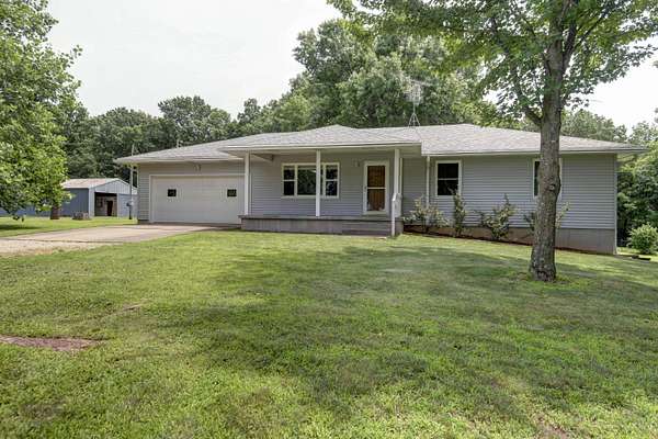 24.7 Acres of Recreational Land with Home for Sale in Greenfield, Missouri
